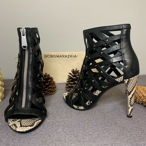 BCBGMAXAZARIA Black leather and snakeskin heels.